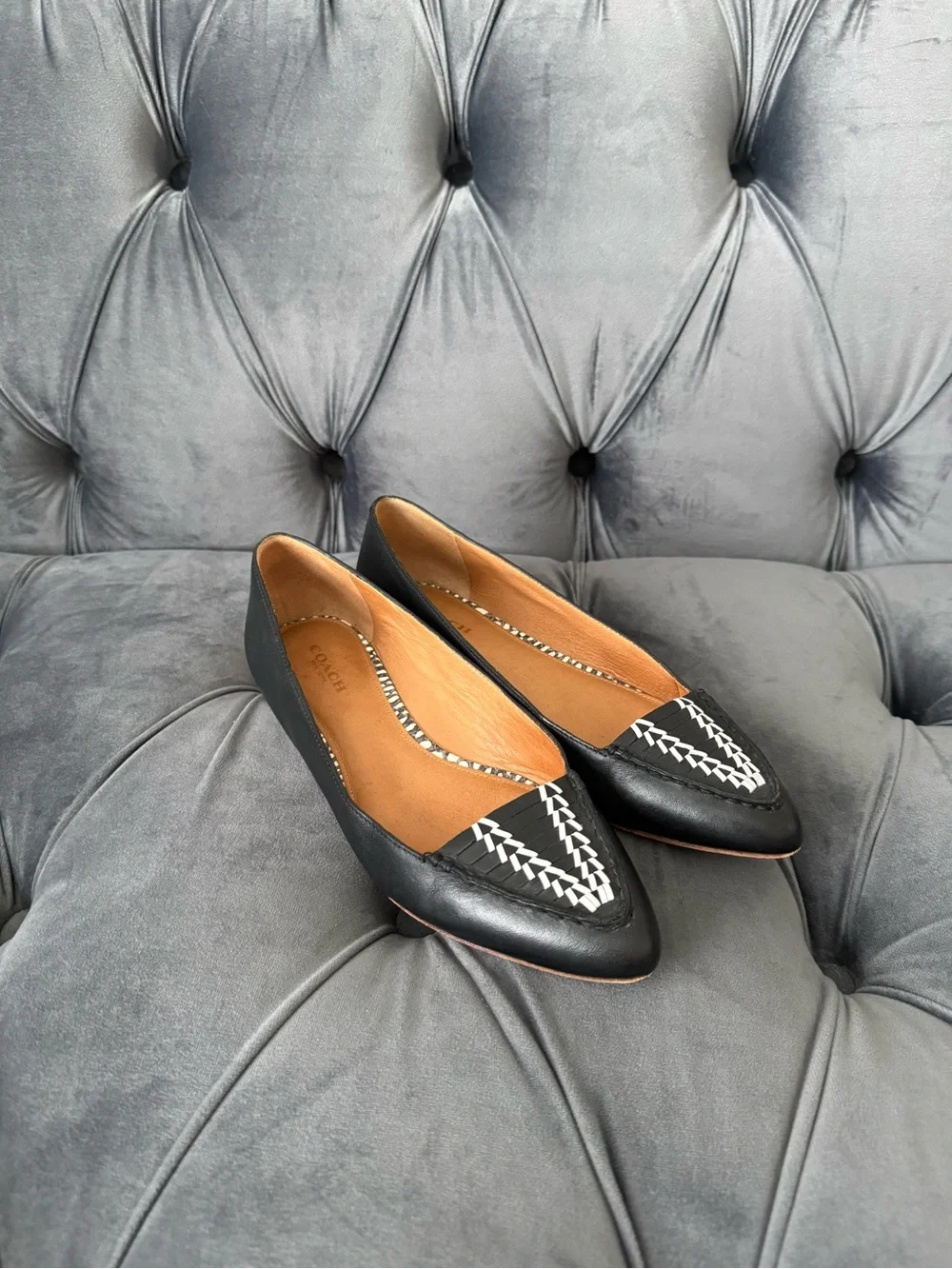 Coach Black Leather Pointed-Toe Flats with White Stitch Detail
